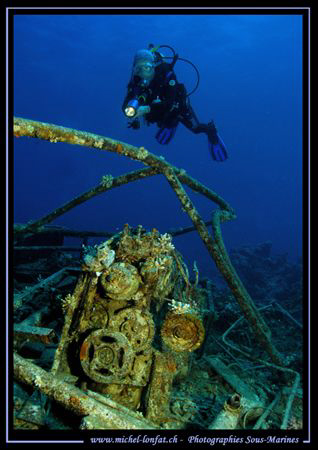 Small Wreck in the Maldives with my wife... Que du bonheu... by Michel Lonfat 