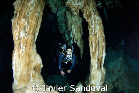 cave diver in 2 ojos cenote by Javier Sandoval 