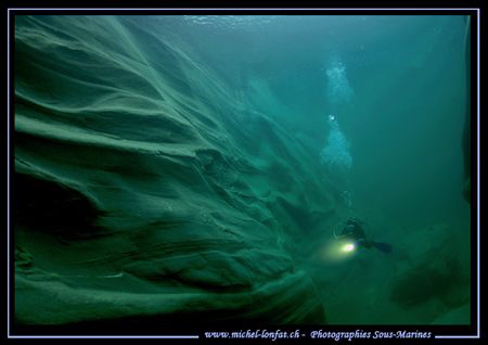 My wife Caroline - diving along the beautiful rocky forma... by Michel Lonfat 