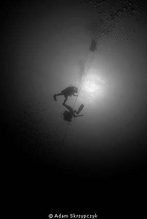 Divers on the way up from the Alma Jane. by Adam Skrzypczyk 
