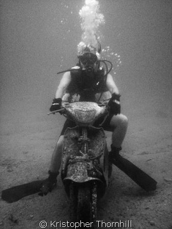 A friend on a recently dumped scooter off Okinawa. Canon ... by Kristopher Thornhill 