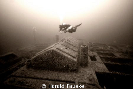 Diving is great  :)     Diver over skylights , ww2 wreck,... by Harald Fauske 
