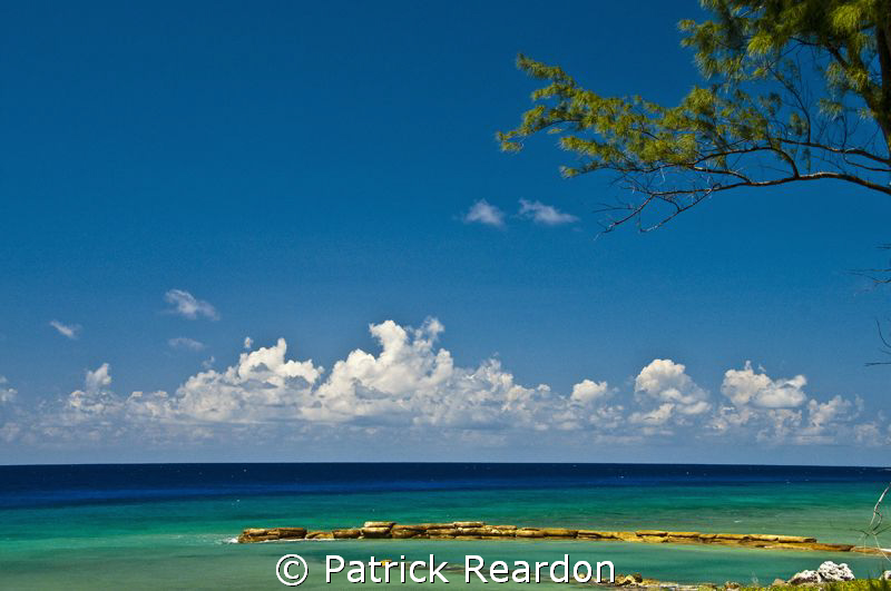 Looking North from Conch Point, Grand Cayman, at mid-day.... by Patrick Reardon 