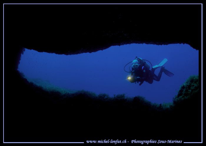 Caroline at the Entrance of a cave in Gozo Malta... Que d... by Michel Lonfat 