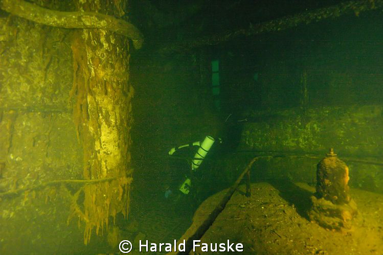 inside engineroom of 128 m long ww2 wreck "fisser" by Harald Fauske 