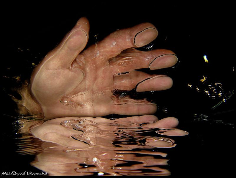 Water, hand and mirror. Taken under water in the swimming... by Veronika Matějková 