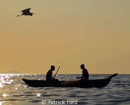 2 fishermen were putting out a net on Lake Malawi near th... by Patrick Ford 