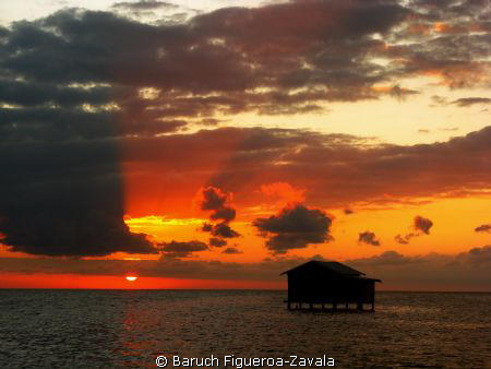 Sunset at Banco Chinchorro Atoll, Quintana Roo, Mexico by Baruch Figueroa-Zavala 