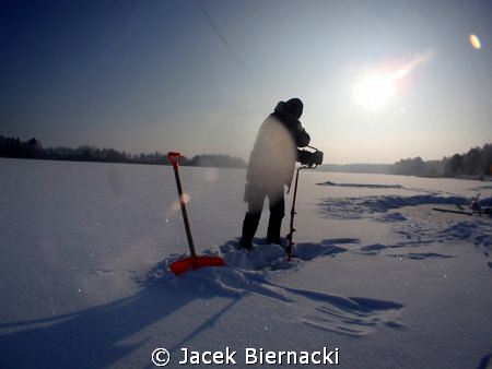 Ice diving by Jacek Biernacki 