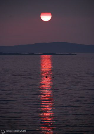 Sunset over Inisbofin.
June 2009. by Mark Thomas 