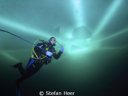Ice Diver with the safety mark in the background. I took ... by Stefan Heer 