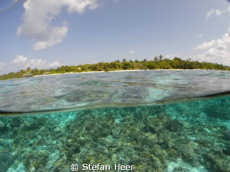 Over/Under Helengeli Maldives with my Sea&Sea DX 1G by Stefan Heer 