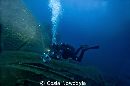 A diver making a video documentary on TETI wreck.  About ... by Gosia Nowodyla 
