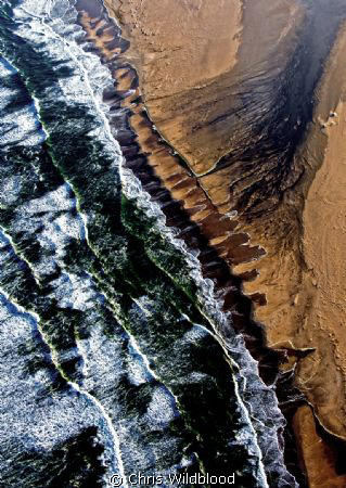 The South Atlantic meets the Skeleton Coast. by Chris Wildblood 