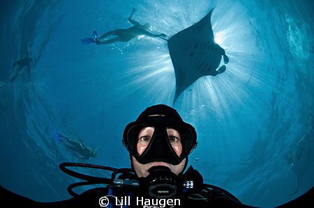 Shooting a self portrait while diving and snorkeling with... by Lill Haugen 