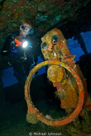 Exploring the Wheel House of the Nippo Maru in Truk Lagoon by Michael Johnson 