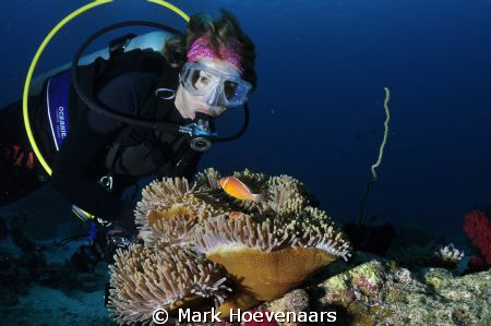 My wife and dive buddy, Cindy, shares a special moment wi... by Mark Hoevenaars 