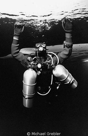 Tech diver with 2 stage tanks under the ice in Morrison's... by Michael Grebler 