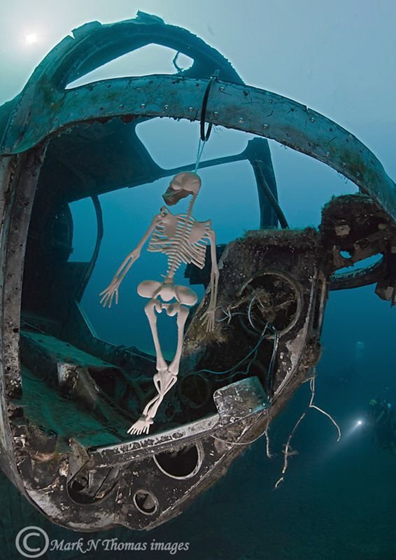 Skeleton crew.
Helicopter sunk in inland quarry. by Mark Thomas 