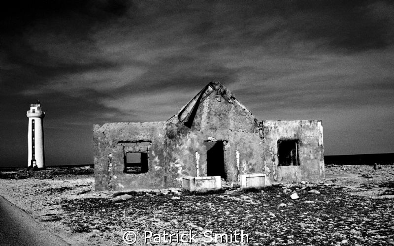 An old film shot of the light keepers home and Lighthouse... by Patrick Smith 