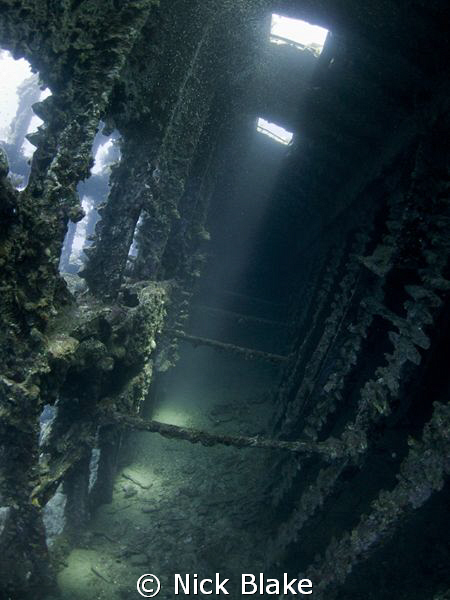 sunlight shines through the wreck of the Carnatic by Nick Blake 