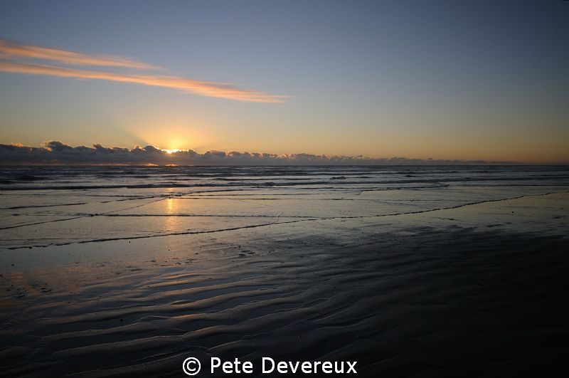 Sunset over Ninety Mile Beach, NZ by Pete Devereux 