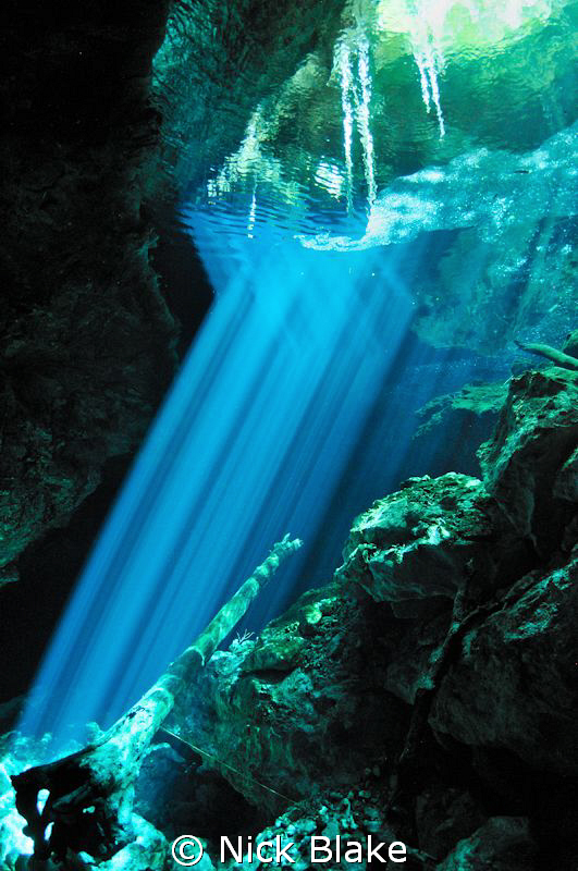 Cenote light refraction, Mexico by Nick Blake 