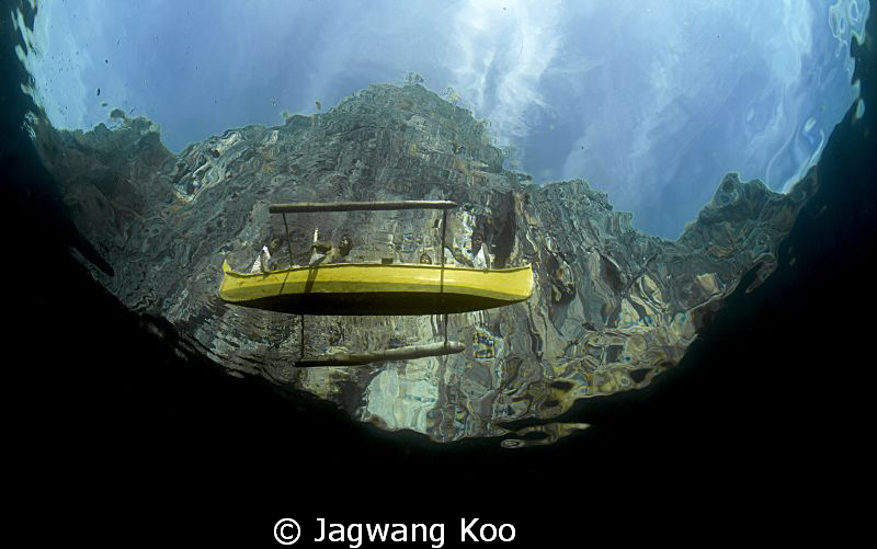Boat & Mountain outside Water by Jagwang Koo 