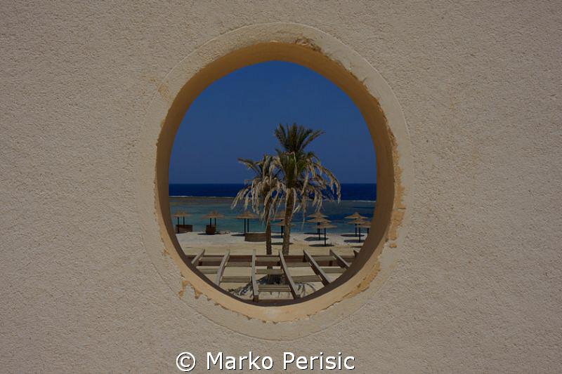 Port hole to the sea by Marko Perisic 