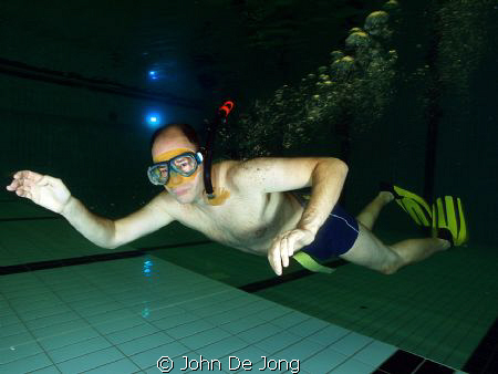 Practicing in the swimming pool. For the divers and for t... by John De Jong 