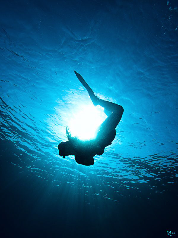 "A female freediver bends around the sun"
This is a over... by Rico Besserdich 