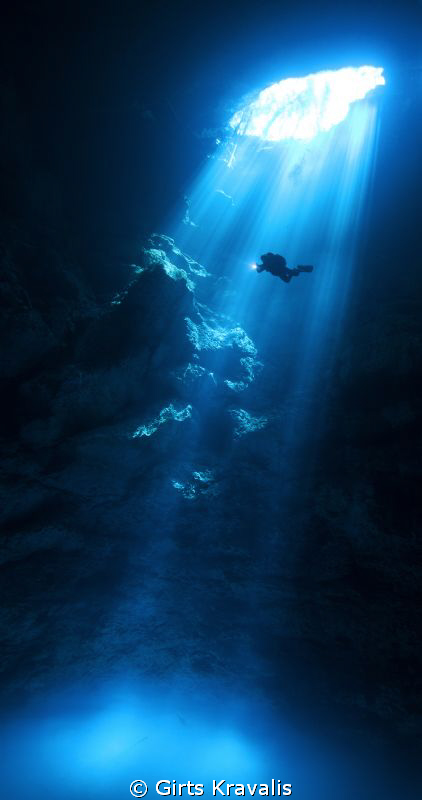 Diver in cenote Pit by Girts Kravalis 