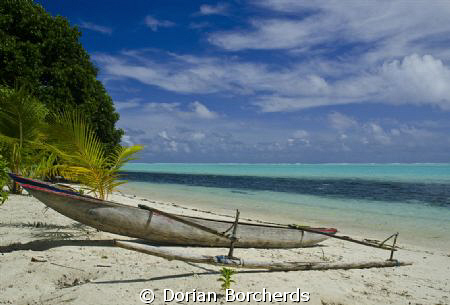 A Canoe on the beach in the New Ireland Province by Dorian Borcherds 