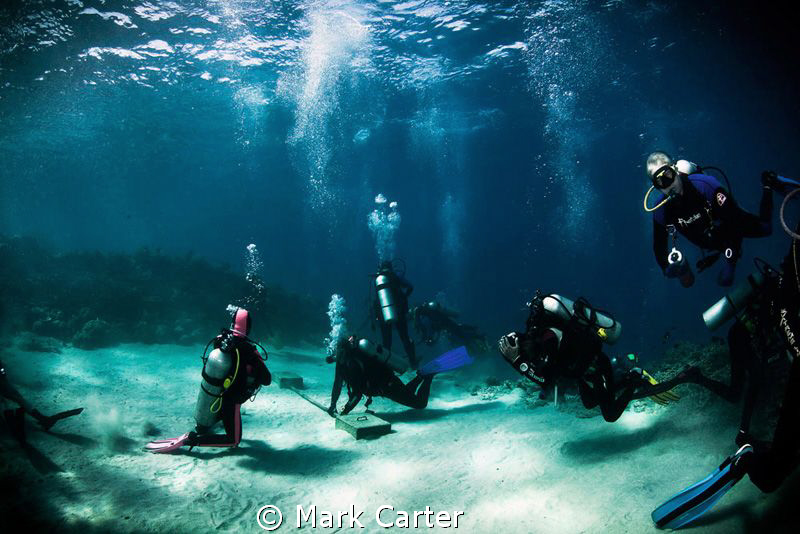 Divers decompressing at 3M stop after deep dive on SS Pre... by Mark Carter 
