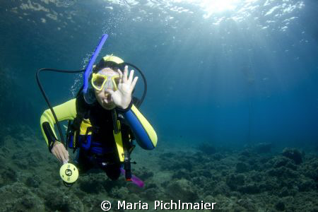 9 year old Natalies answer to the "thumb up" sign :-) by Maria Pichlmaier 