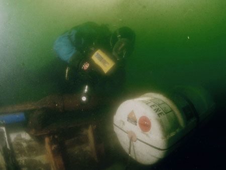 A diver investigates why this liferaft didn't deploy when... by Michael Grebler 