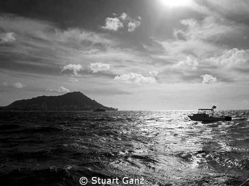 Surface interval with Diamond Head on the horizon and a s... by Stuart Ganz 