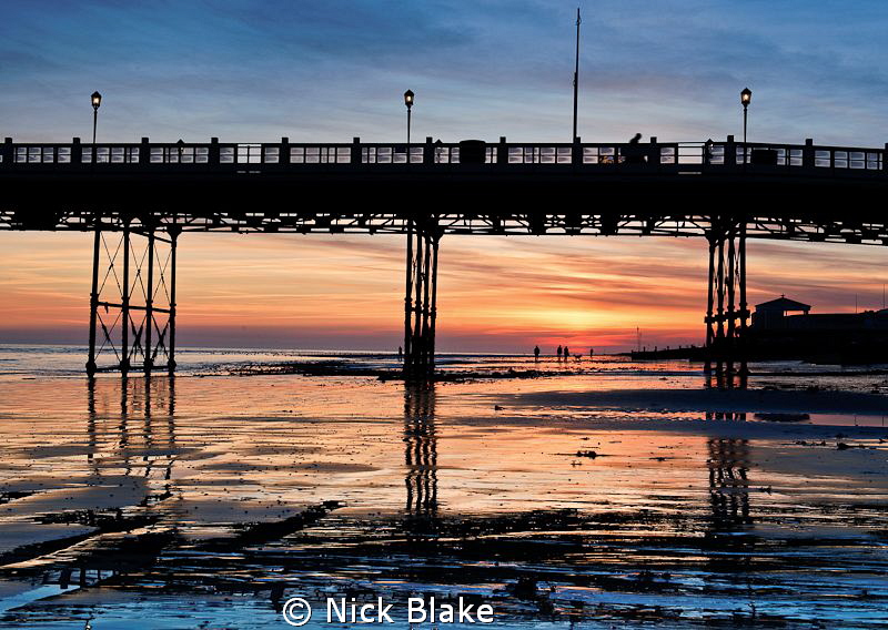 Sunset on the seafront at Worthing Pier, West Sussex. by Nick Blake 