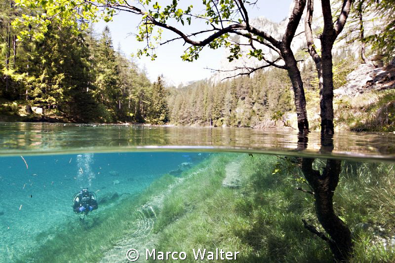 Another half & half shot from the 'green lake' in Austria by Marco Walter 