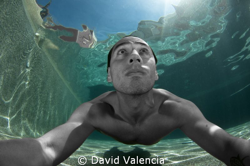 a self-portrait in the pool. by David Valencia 