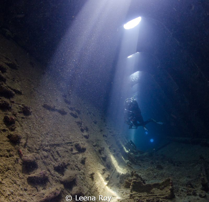 Diver in wreck of  Umbria by Leena Roy 