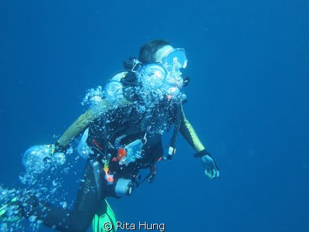 Acending after a deep dive. by Rita Hung 