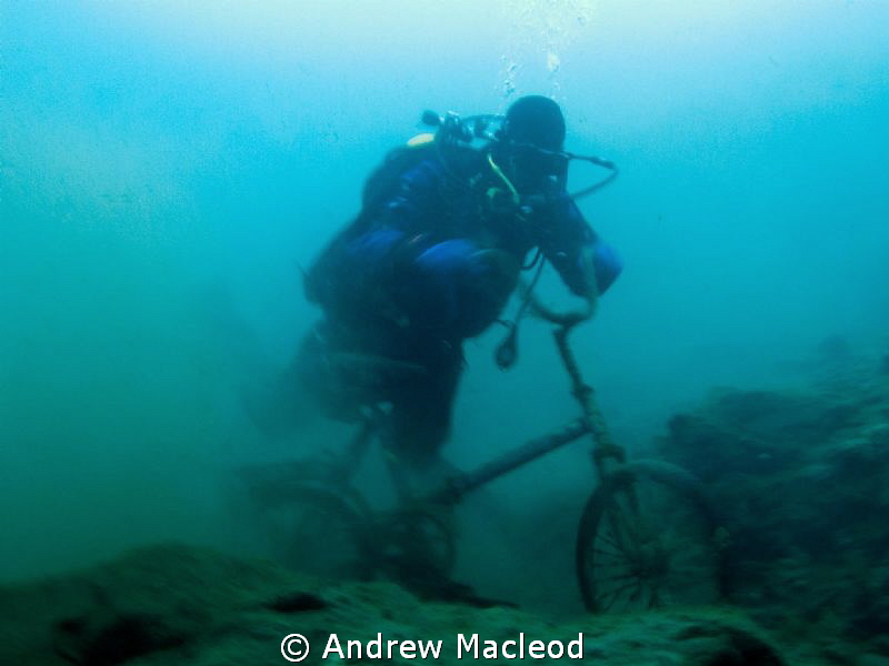 A bike in lake Baikal by Andrew Macleod 