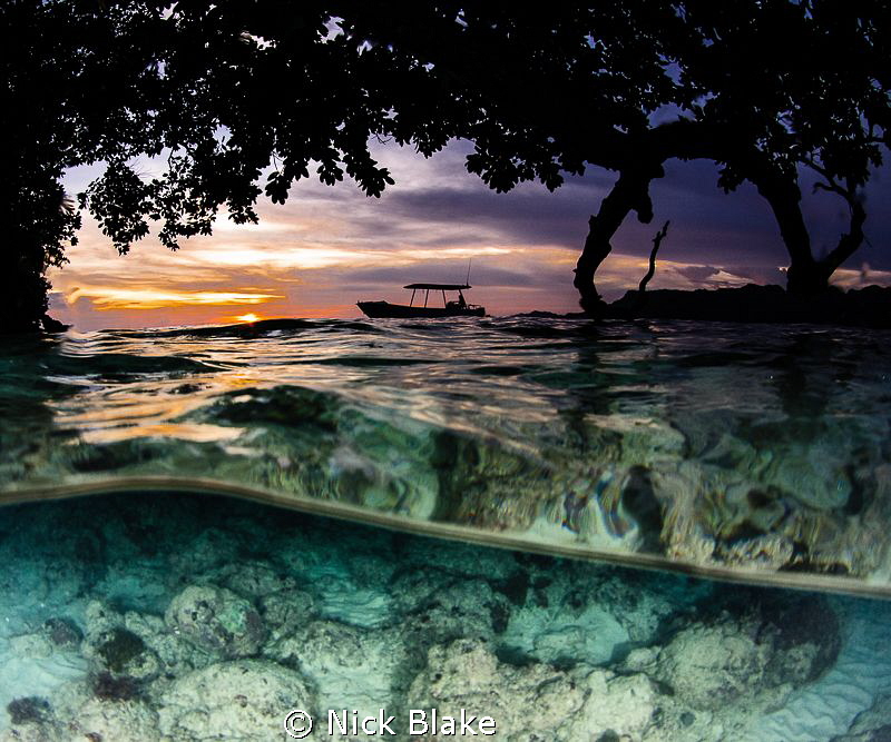 Sunset in Misool, Indonesia by Nick Blake 