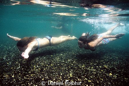 Girls swimming in the clear waters of Tarawera River
Not... by Daniel Poloha 