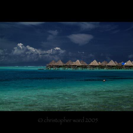 Bora Bora, French Polynesia. Stilt huts, 87 degree water,... by Christopher Ward 