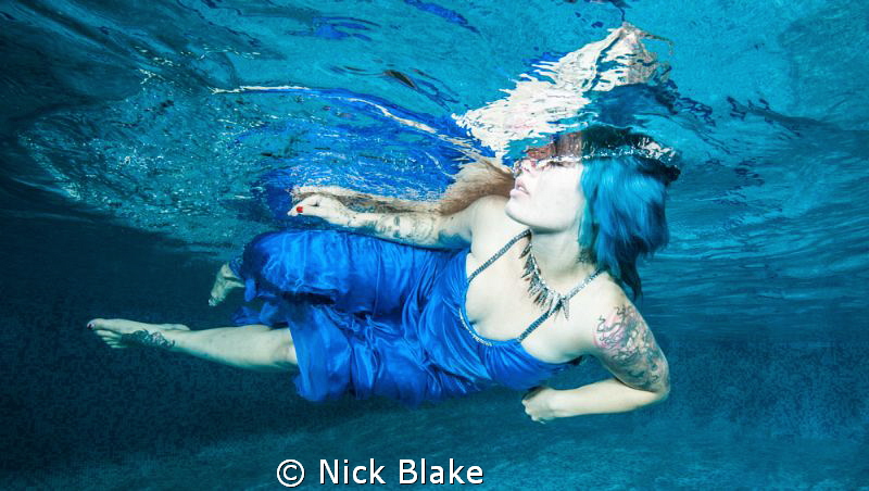 Model shot from a pool photoshoot, UK. by Nick Blake 