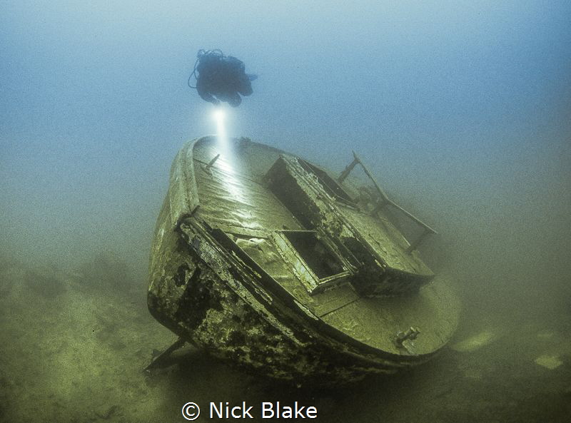 HMS Podsnap viewed from the stern, Capernwray, UK by Nick Blake 