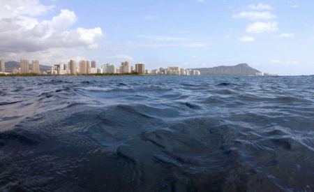 About to submerge...Diamond Head off Waikiki. by Glenn Poulain 