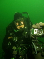Diver adjusts Go Pro camera mounted on top of the Shark Marine Navigator,a one man navigation and sonar reconnaissance unit. 